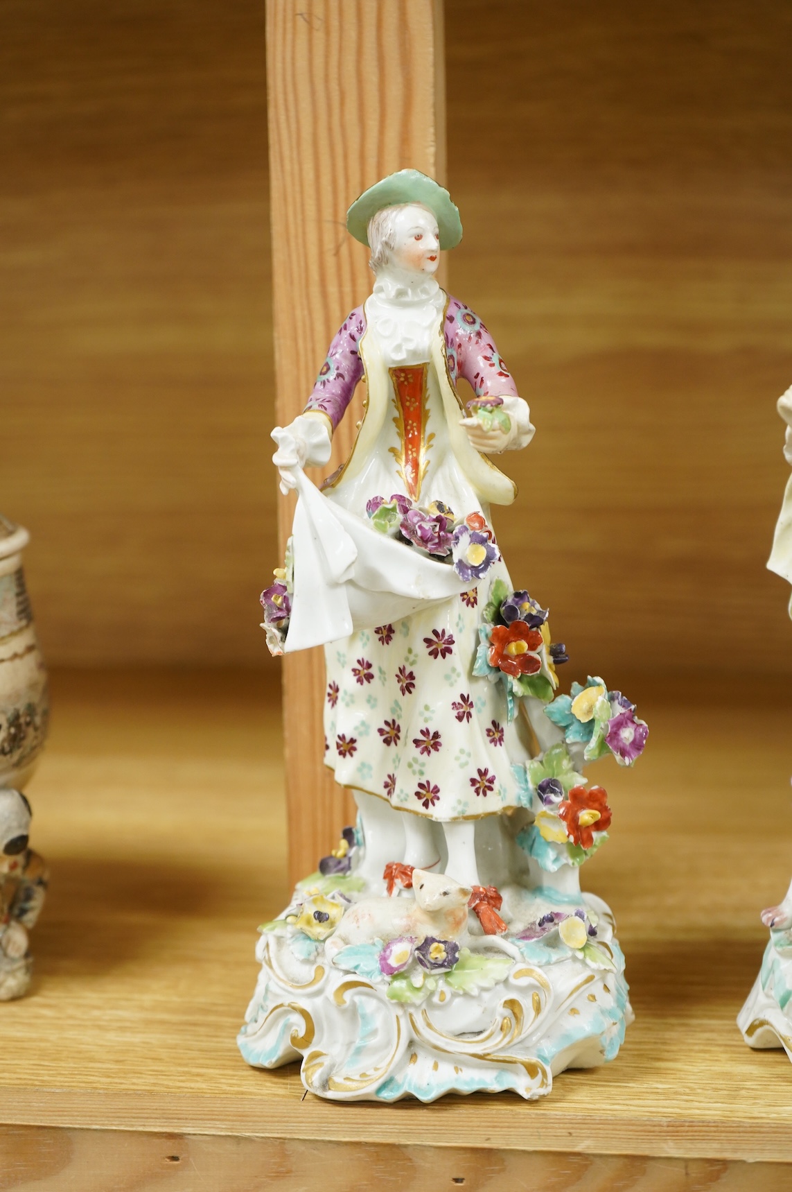 A pair of early Derby figures of a lady and gentleman, c.1758, tallest 22cm high